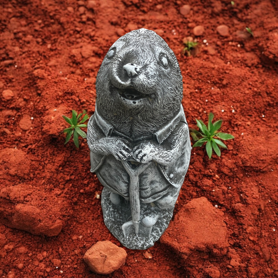 Concrete Mole holding a Spade £10